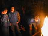 Chris and Gary look on as Fred studies
