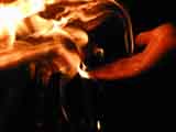 trying to hold flames