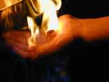 holding flames