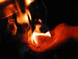 holding flames