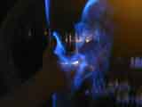 mysterious hand holding flames