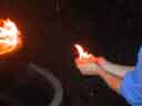 Bob holds flames -- flame in hands