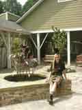 Kiki and her lily fountain at First Montessori of Atlanta